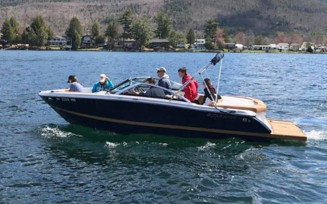 Boats moored at a Lake George marina.