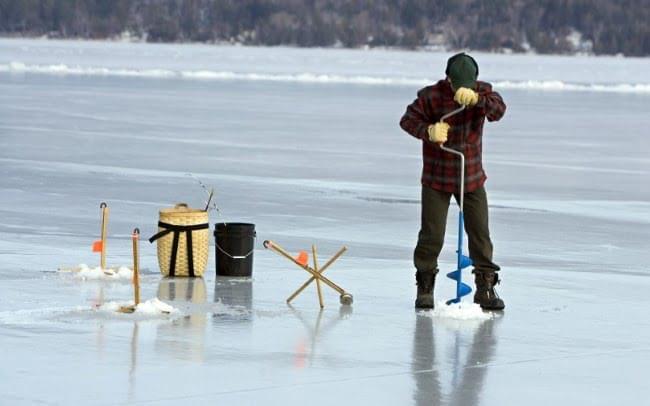 Ice fishing hut on a frozen Lake George.
