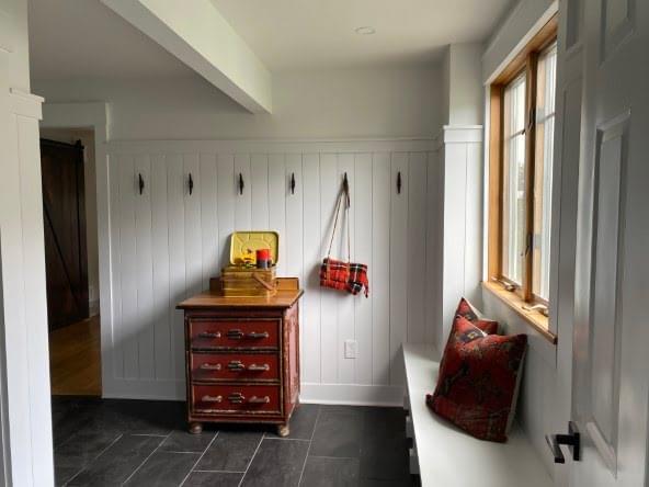 Mud room with built-in storage for coats, shoes, and vacation essentials.
